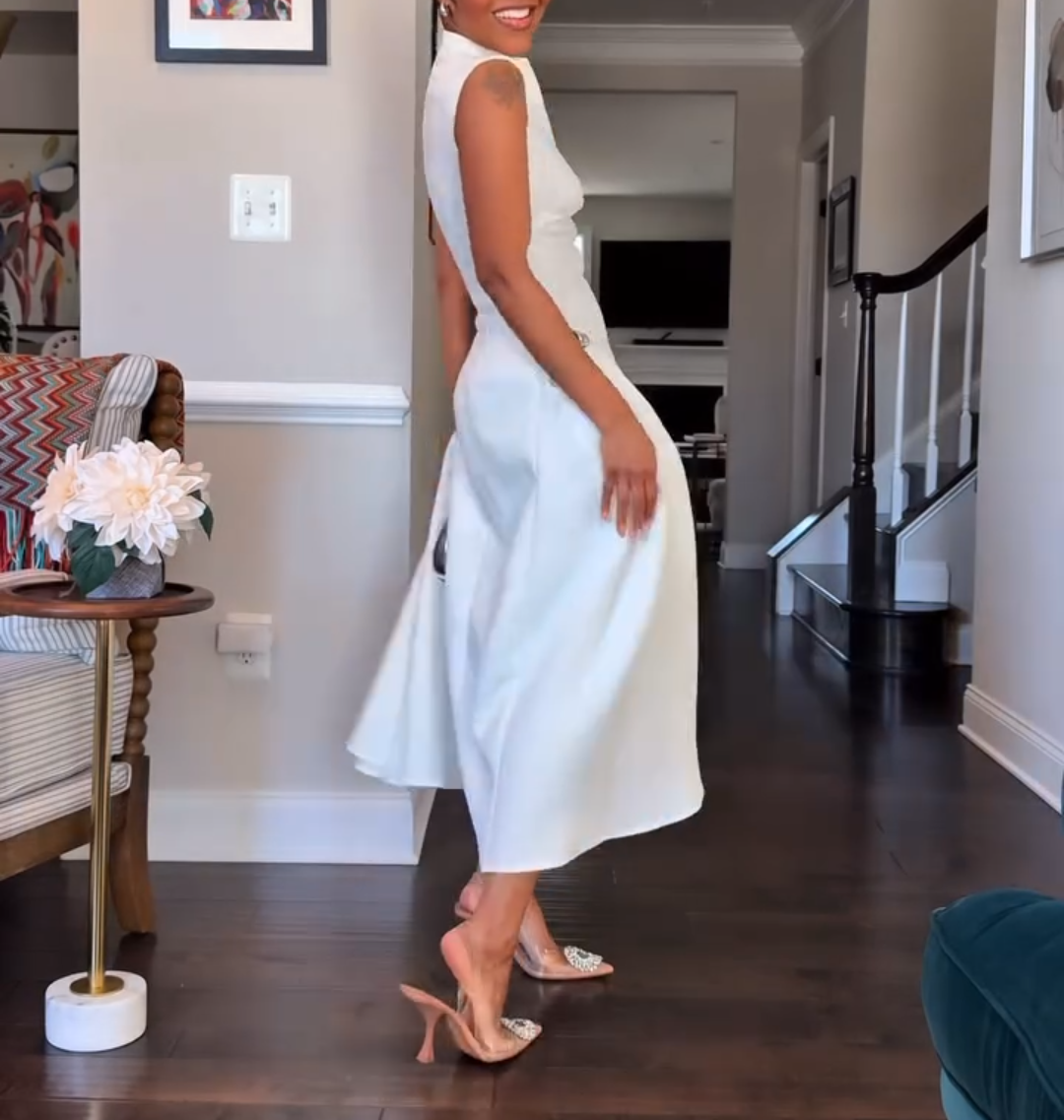 White sleeveless irregular neckline dress