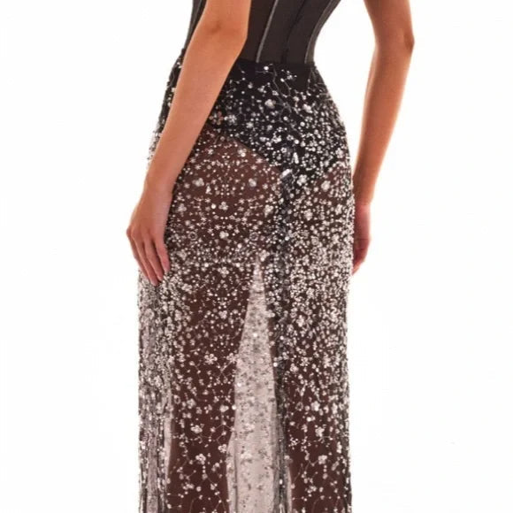 A Gorgeous Evening Gown Encrusted With Crystals